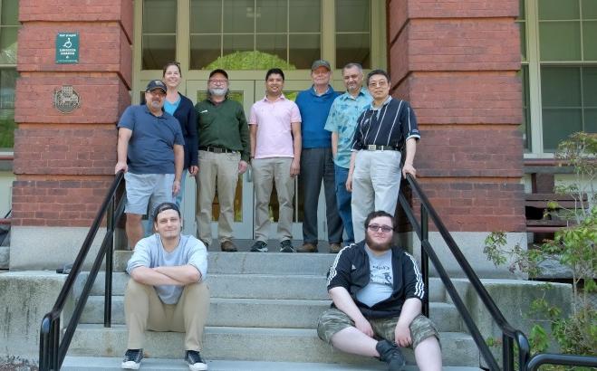 Computer Science faculty and staff on steps of Edgerly Hall